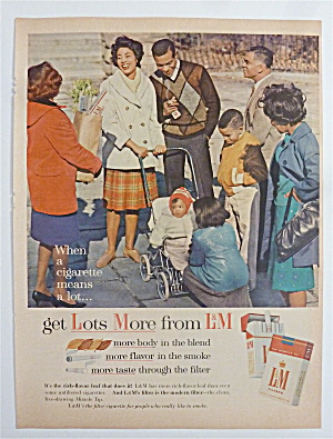 1963 L & M Cigarettes With Man & Woman Showing Off Baby