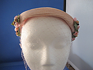 Pink Straw Hat With Flowers And A Net