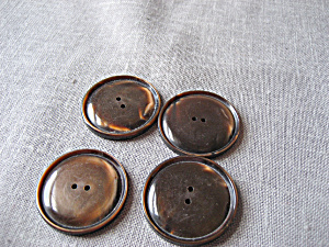 Four Plastic Brown Buttons